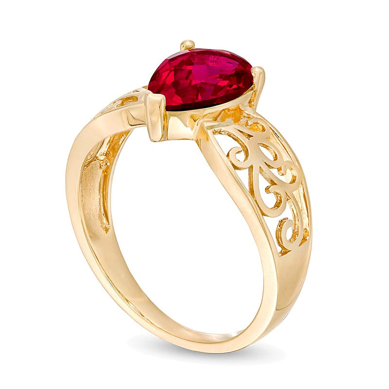 Fashion-Ring mit tropfenförmigem Labor-Rubin in 10K Gelbgold