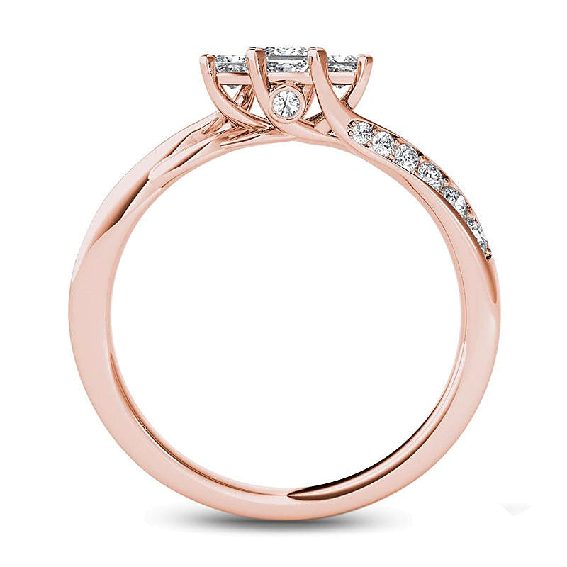 0.5 ct. Gesamtgewicht Dreistein-Ring mit Diamanten im Princess-Schliff und gedrehter Ringschiene in 14K Roségold