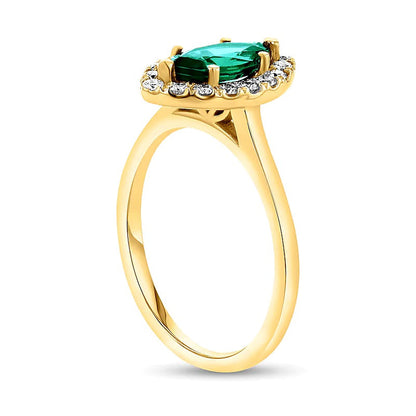 Ring mit Smaragd im Marquise-Schliff und Diamanten 0,25 ct. Gesamtgewicht als Halo in 14K Gelbgold