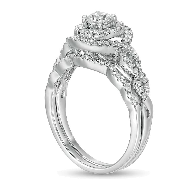 Braut-Set mit Diamanten in rund und oval, 1.0 ct. Gesamtgewicht, doppeltem ovalem Rahmen und gedrehter Ringschiene in 10K Weißgold
