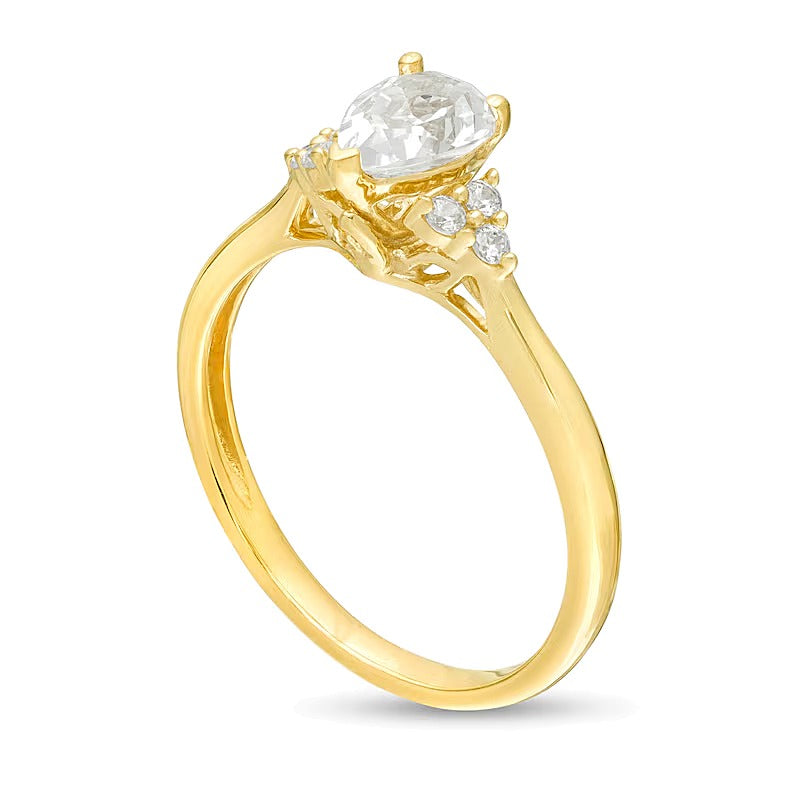 Verlobungsring Solitär mit seitlichem Besatz mit tropfenförmigem und rundem Diamant 0,63 ct. Gesamtgewicht in 14K Gelbgold