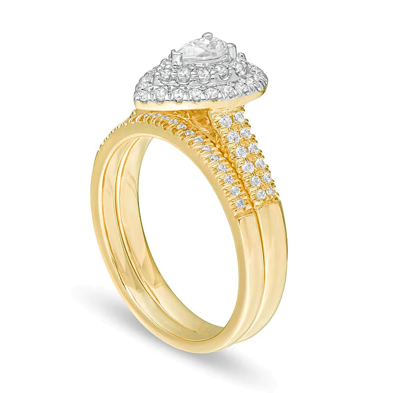 Braut-Set mit tropfenförmigen und runden Diamanten 0,75 ct. Gesamtgewicht in 14K Gelbgold