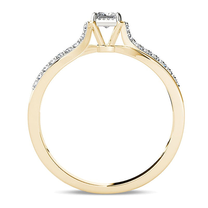 0.25 ct. Gesamtgewicht Solitär mit seitlichem Besatz mit Diamanten im Princess- und Rundschliff in 14K Gelbgold