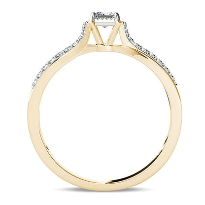 0.25 ct. Gesamtgewicht Solitär mit seitlichem Besatz mit Diamanten im Princess- und Rundschliff in 14K Gelbgold