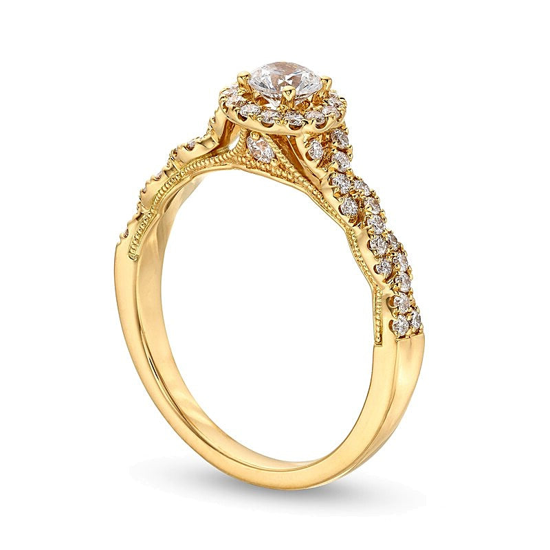 Halo Verlobungsring mit weißen Diamanten im Rundschliff 0,75 ct. Gesamtgewicht in 14K Gelbgold