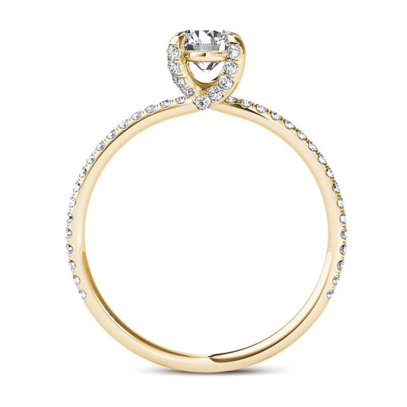 Solitär mit seitlichem Besatz Verlobungsring 0.75 ct. Gesamtgewicht Diamant in 14K Gelbgold