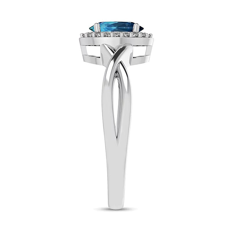 Ring mit ovalem Swiss Blue Topas und 0,07 ct. Gesamtgewicht Diamanten mit Rahmen und Crossover-Schiene in 10K Weißgold