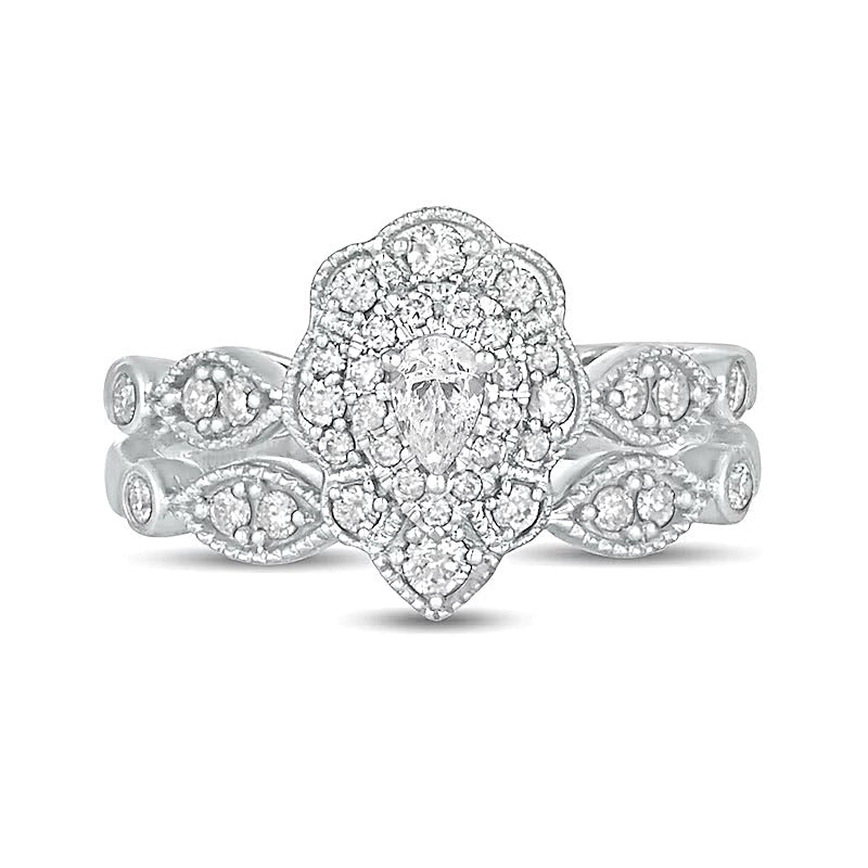 0,63 ct. Gesamtgewicht Diamant-Brautset im Vintage-Stil mit tropfenförmigen und runden Diamanten, doppeltem Blütenrahmen in 10K Weißgold