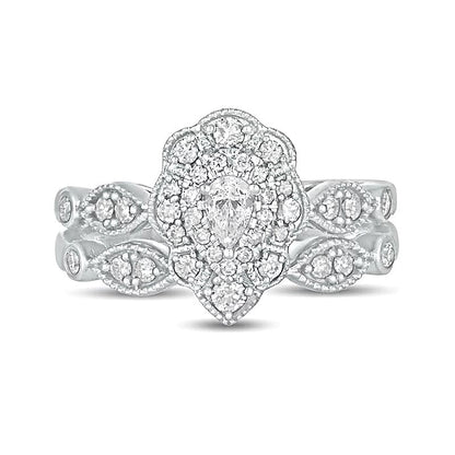 0,63 ct. Gesamtgewicht Diamant-Brautset im Vintage-Stil mit tropfenförmigen und runden Diamanten, doppeltem Blütenrahmen in 10K Weißgold