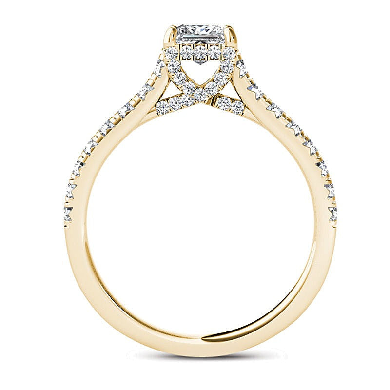 0.75 ct. Gesamtgewicht Solitär mit seitlichem Besatz mit Diamanten im Princess- und Rundschliff in 14K Gelbgold
