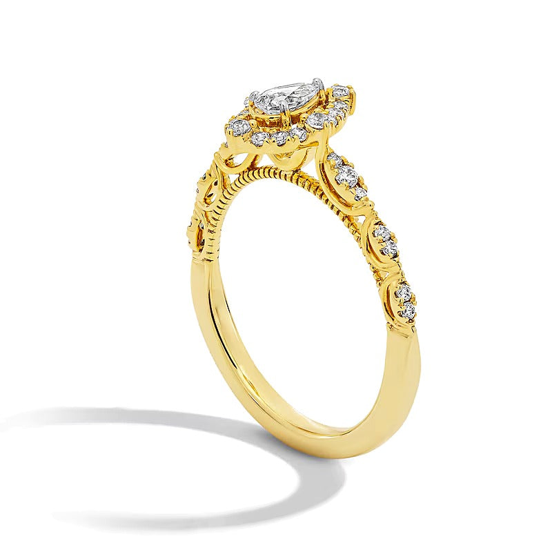 0.5 ct. Gesamtgewicht Halo-Verlobungsring mit tropfenförmigem Diamant in 14K Gelbgold (I/I1)