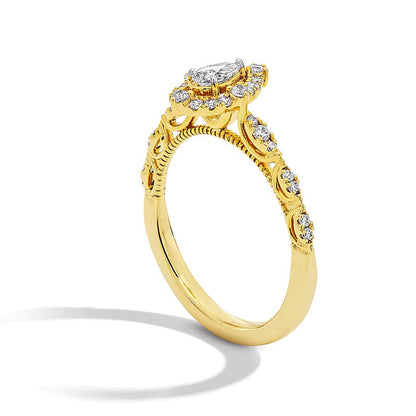 0.5 ct. Gesamtgewicht Halo-Verlobungsring mit tropfenförmigem Diamant in 14K Gelbgold (I/I1)