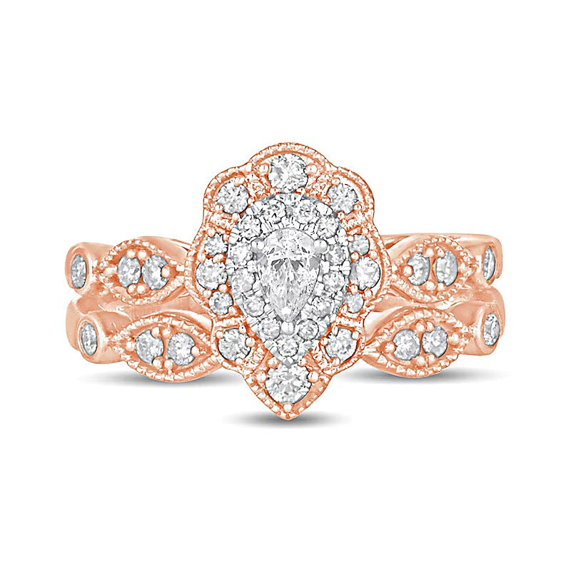 0,63 ct. Gesamtgewicht Brautset mit tropfenförmigem Diamant im Vintage-Stil mit doppeltem Blütenrahmen in 10K Roségold