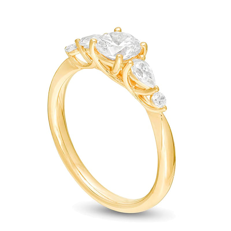 Solitär mit seitlichem Besatz mit rundem und tropfenförmigem Diamant 1.0 CT. Gesamtgewicht in 14K Gelbgold