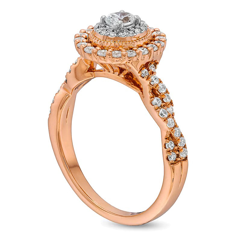 0.63 CT. TW Verlobungsring mit ovalem Diamant und Halo im Vintage-Stil mit gedrehter Ringschiene in 10K Roségold