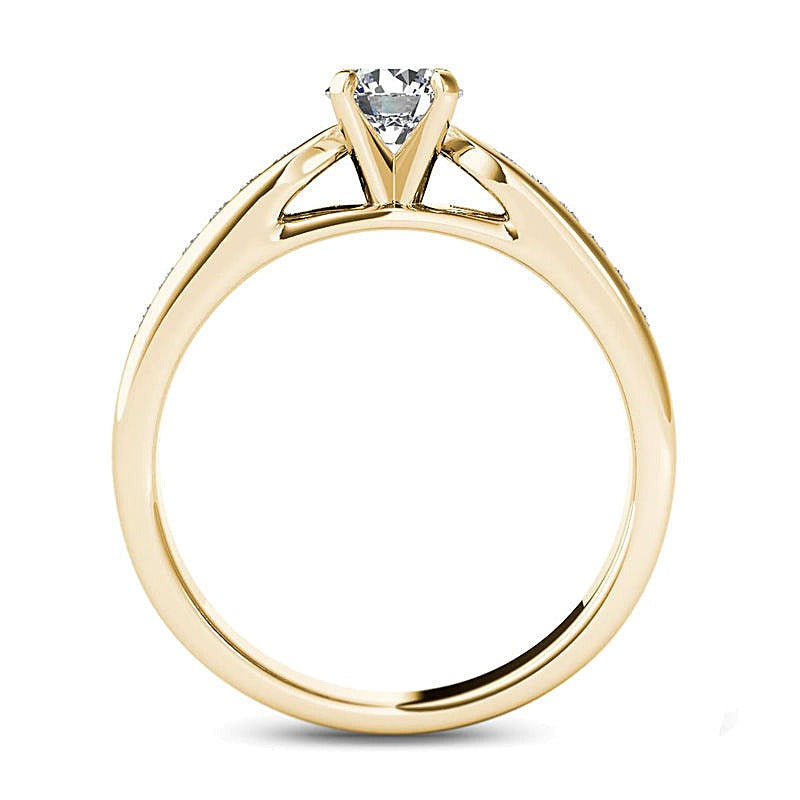 0.63 ct. Gesamtgewicht Diamant-Verlobungsring als Solitär mit seitlichem Besatz in 14K Gelbgold