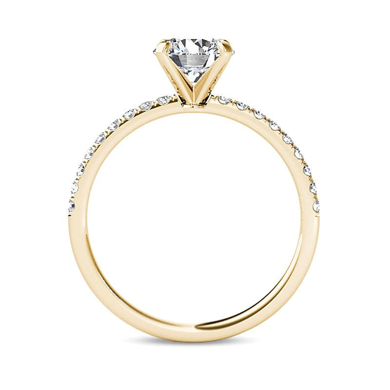 Solitär mit seitlichem Besatz mit Diamanten 1.0 CT. Gesamtgewicht in 14K Gelbgold