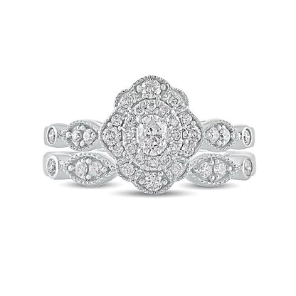 0,63 ct. Gesamtgewicht Diamant-Brautset mit ovalem Mittelstein und Vintage-Doppelblüten-Fassung in 10K Weißgold