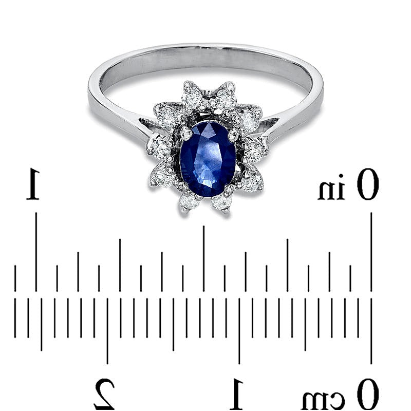 Verlobungsring mit ovalem blauem Saphir und Diamanten 0,14 ct. Gesamtgewicht im Halo in 14K Weißgold