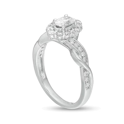 0,75 ct. Gesamtgewicht Verlobungsring im Vintage-Stil mit ovalem Diamant, Halo und gedrehtem Ring in 10K Weißgold