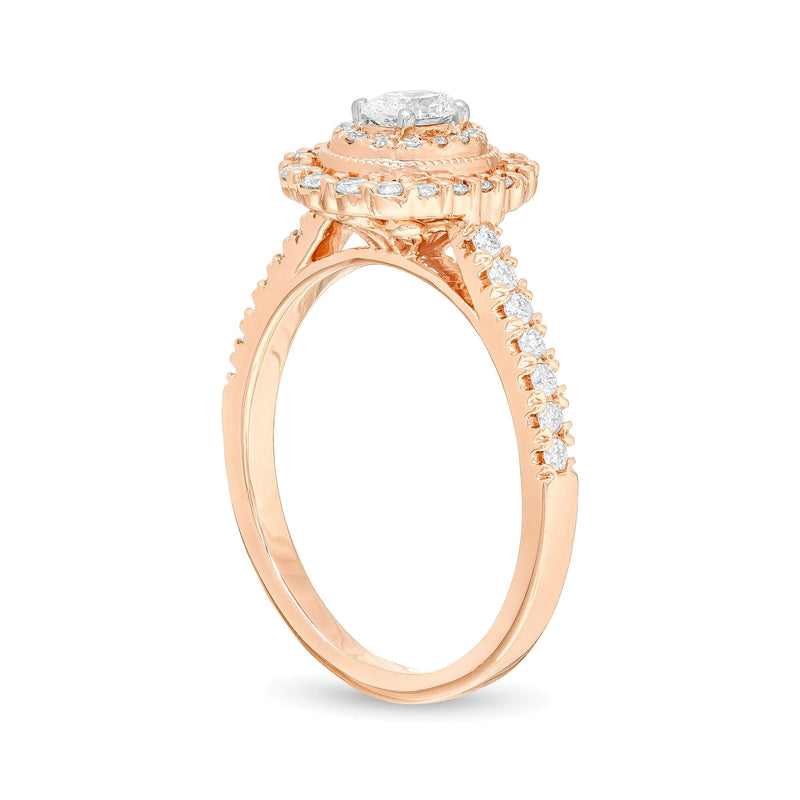 0.63 ct. Gesamtgewicht Halo-Verlobungsring im Vintage-Stil mit ovalem Diamant in 10K Roségold