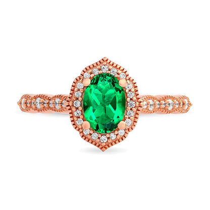 Halo-Ring im Vintage-Stil mit ovalem Smaragd und 0,17 ct. Gesamtgewicht Diamanten in 10K Roségold