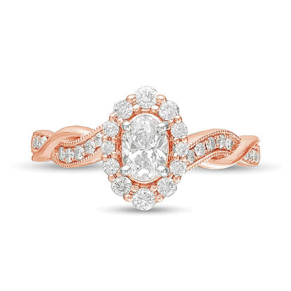 0,75 ct. Gesamtgewicht Verlobungsring im Vintage-Stil mit ovalem Diamanten, Halo und gedrehter Ringschiene in 10K Roségold