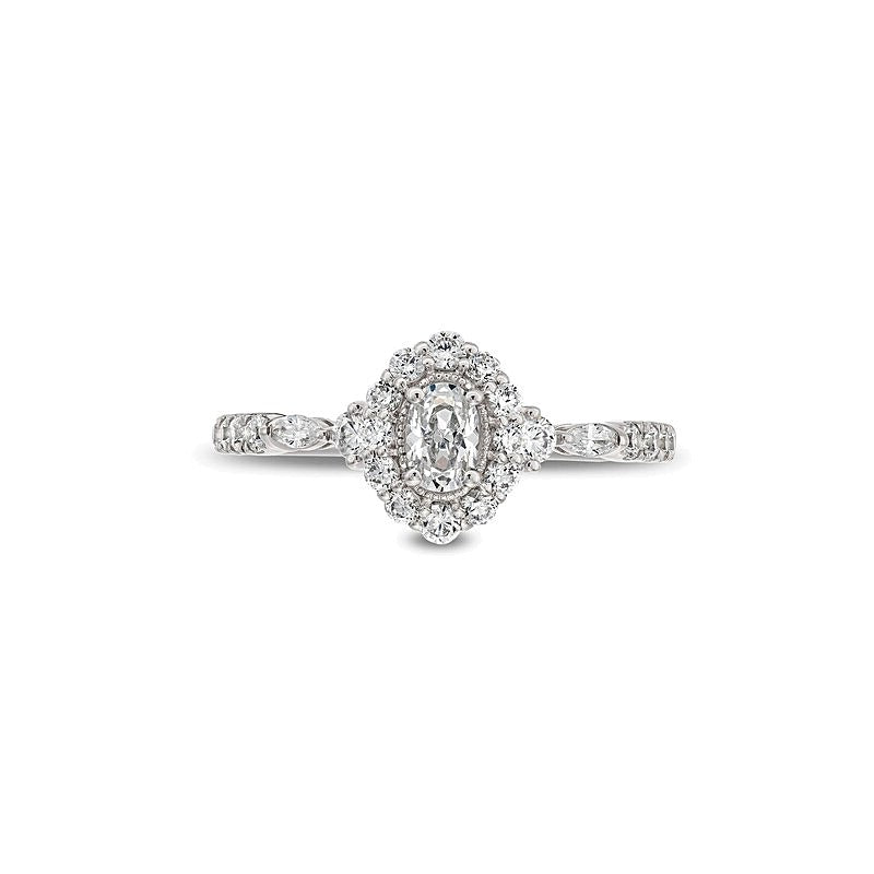 0.75 ct. Gesamtgewicht Verlobungsring im Vintage-Stil mit Halo und ovalem Diamant in 14K Weißgold