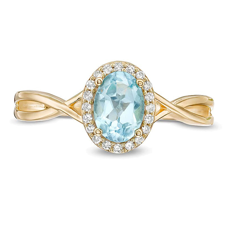 Fashion-Ring mit ovalem Swiss Blue Topaz und 0,07 ct. Gesamtgewicht Diamanten in 10K Gelbgold