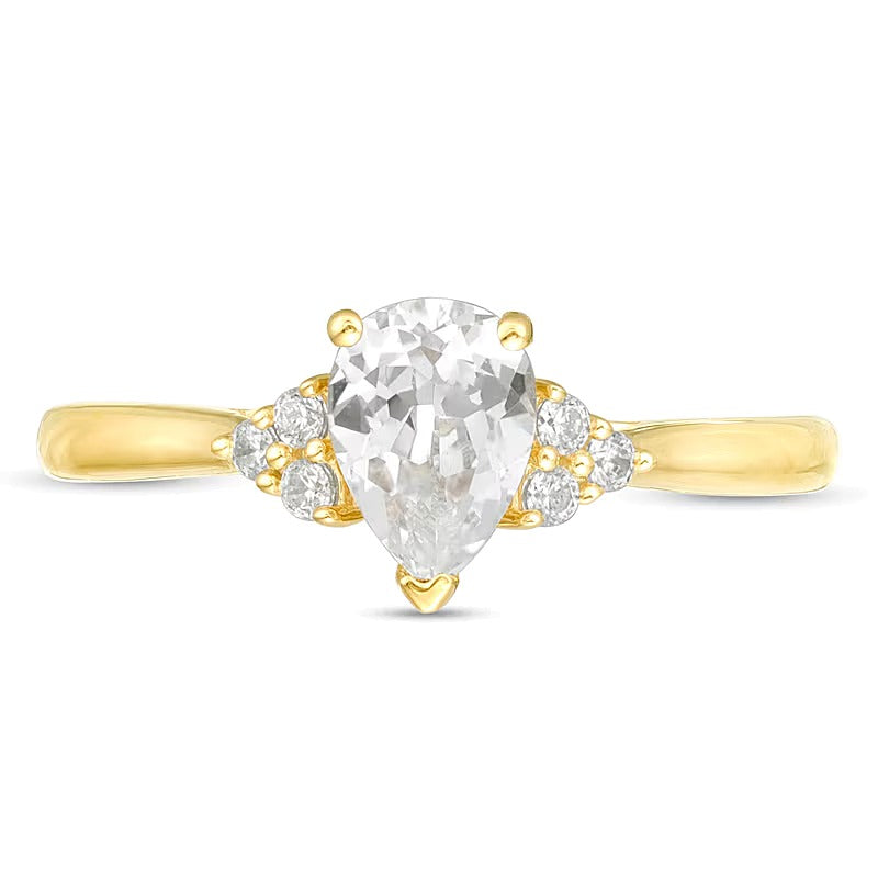 Verlobungsring Solitär mit seitlichem Besatz mit tropfenförmigem und rundem Diamant 0,63 ct. Gesamtgewicht in 14K Gelbgold