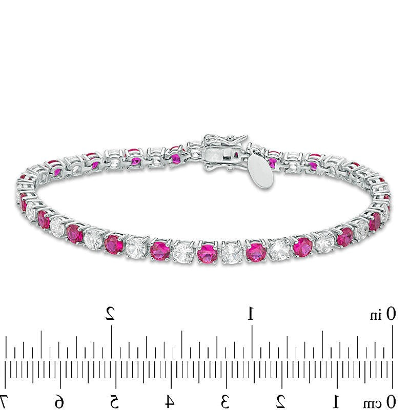 4,0mm Tennisarmband mit Labor-Rubinen und weißen Saphiren im Wechsel aus rhodiniertem Sterlingsilber - 7,25"