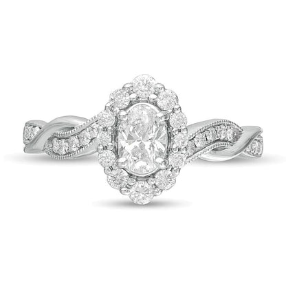 0,75 ct. Gesamtgewicht Verlobungsring im Vintage-Stil mit ovalem Diamant, Halo und gedrehtem Ring in 10K Weißgold