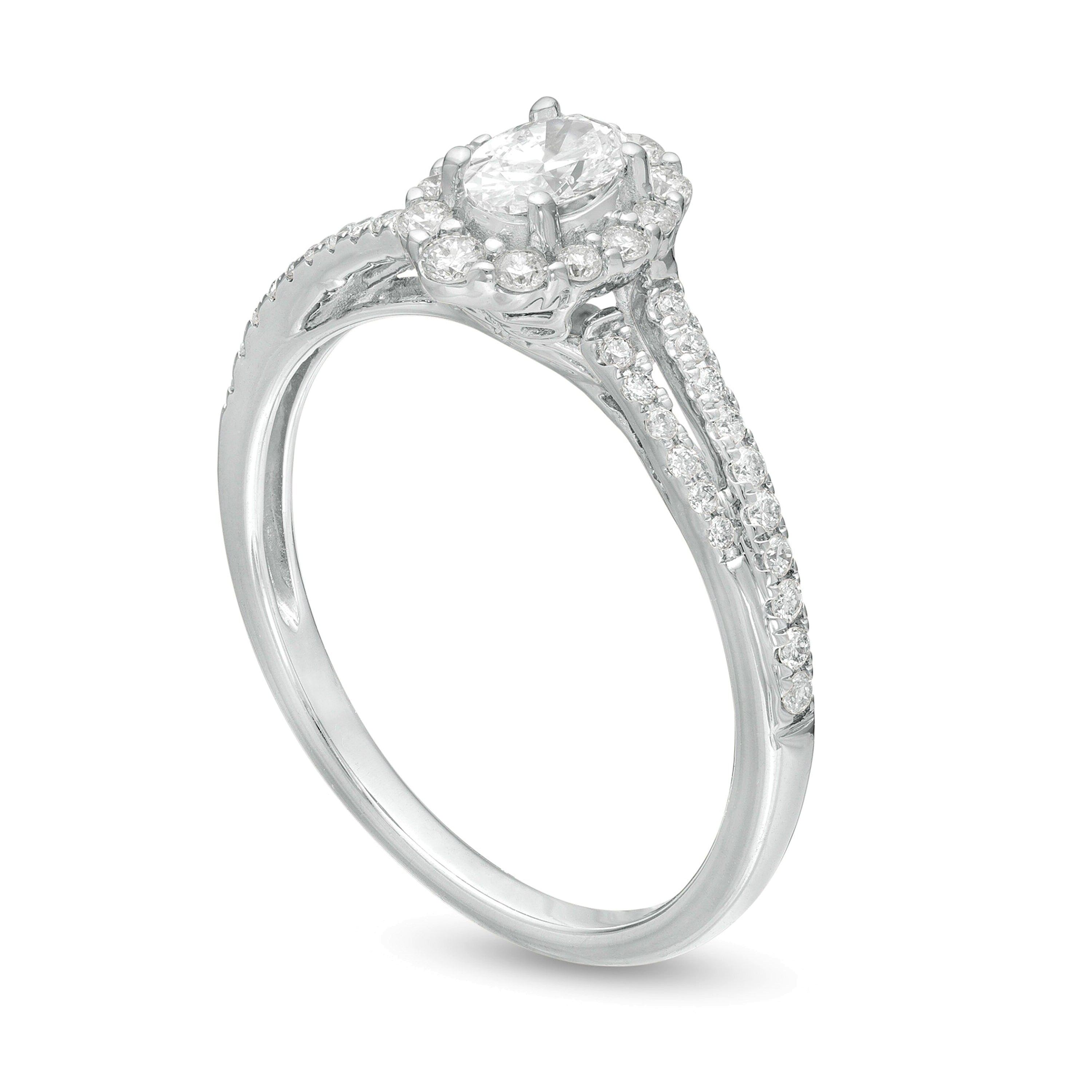 0.5 CT. Gesamtgewicht Verlobungsring mit ovalem Diamant-Halo und geteilter Schiene in 10K Weißgold