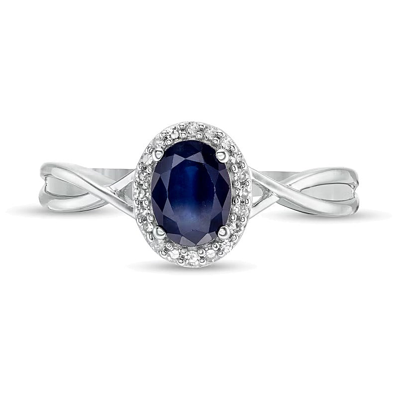 Ring mit ovalem blauem Saphir und 0,07 ct. Gesamtgewicht Diamanten in 10K Weißgold