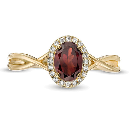 Ring mit ovalem Granat und 0,07 ct. Gesamtgewicht Diamanten mit gedrehter Ringschiene in 10K Gelbgold für Damen