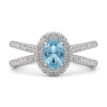 Ring mit ovalem Aquamarin und 0,33 ct. Gesamtgewicht Labordiamanten in 14K Weißgold
