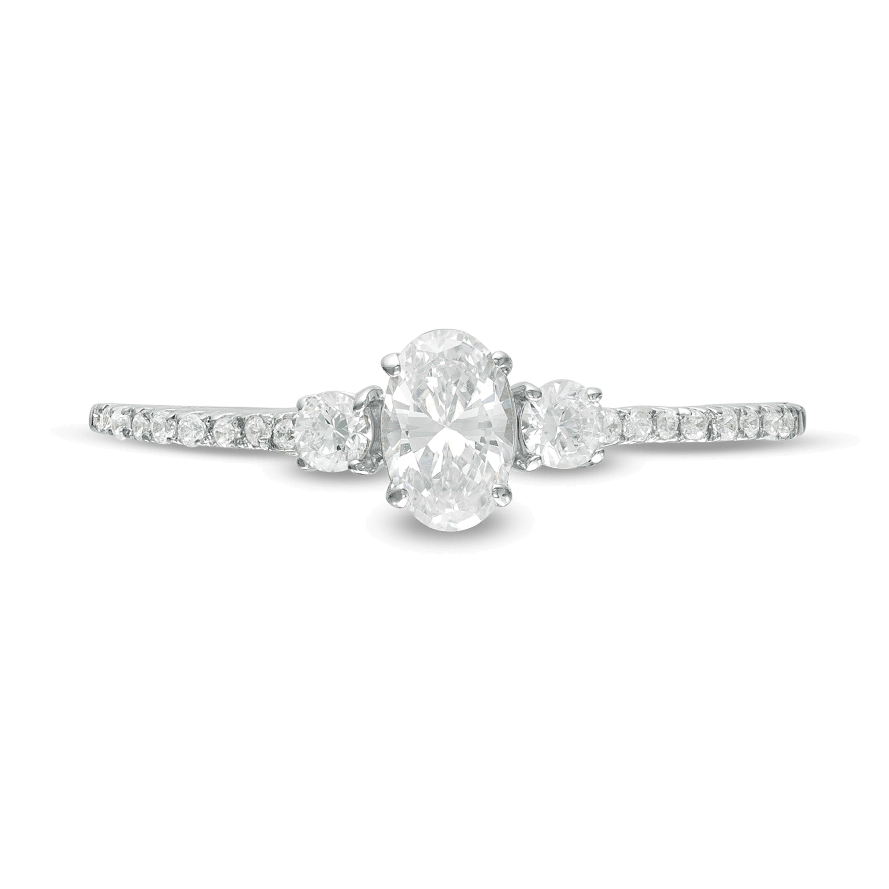 Dreistein-Verlobungsring 0,63 ct. Gesamtgewicht mit Diamanten im Oval- und Rundschliff in 14K Weißgold