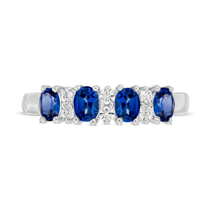 Ring mit ovalem blauem Saphir und Diamanten 0,1 ct. Gesamtgewicht im Vierstein-Wechseldesign in 14K Weißgold