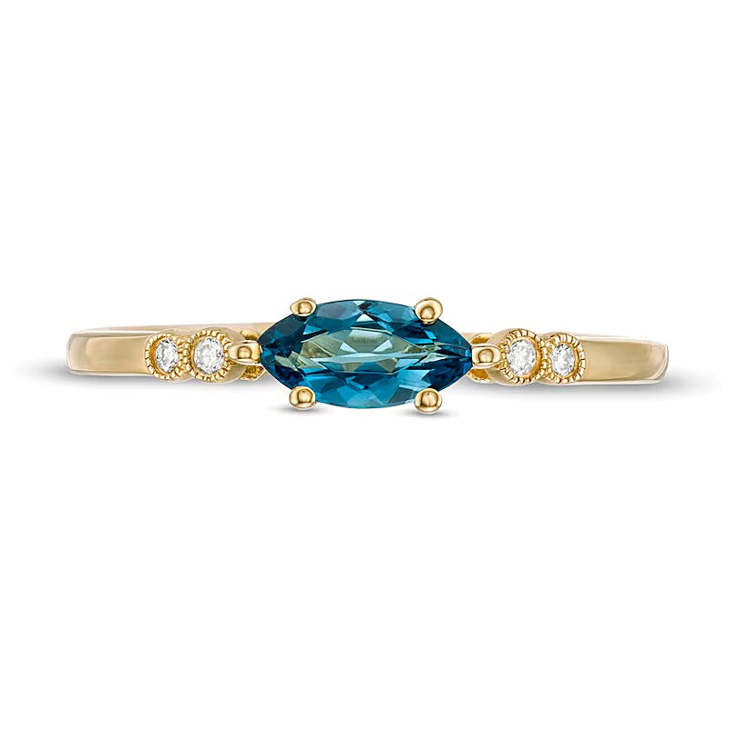 Fashion-Ring mit Marquise-Topas in Blau und Diamant in 14K Gelbgold