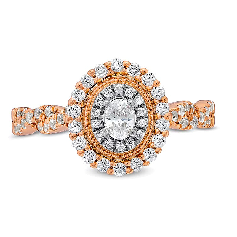 0.63 CT. TW Verlobungsring mit ovalem Diamant und Halo im Vintage-Stil mit gedrehter Ringschiene in 10K Roségold