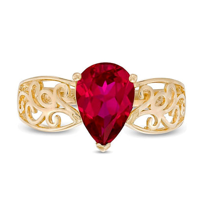 Fashion-Ring mit tropfenförmigem Labor-Rubin in 10K Gelbgold