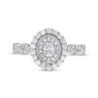 0.63 ct. Gesamtgewicht Verlobungsring mit Diamanten in Oval und rund im Vintage-Stil mit gedrehter Ringschiene aus 10K Weißgold