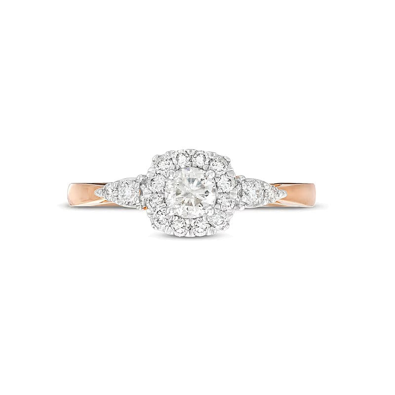 Verlobungsring mit Halo, 0.5 ct. Gesamtgewicht Diamant im Kissenschliff-Rahmen mit Blattseiten in 10K Roségold (J/I3)