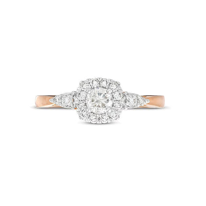 Verlobungsring mit Halo, 0.5 ct. Gesamtgewicht Diamant im Kissenschliff-Rahmen mit Blattseiten in 10K Roségold (J/I3)