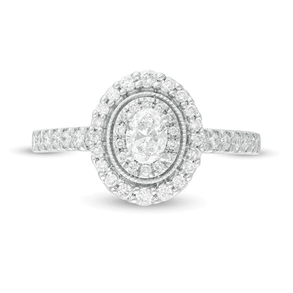 0,63 ct. Gesamtgewicht Halo-Verlobungsring im Vintage-Stil mit ovalem Diamant in 10K Weißgold