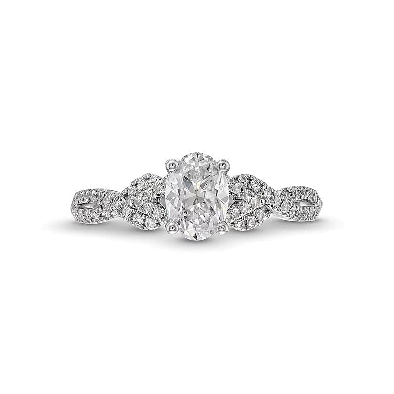 0,75 ct. Gesamtgewicht Verlobungsring Solitär mit seitlichem Besatz mit ovalem Diamant in 14K Weißgold