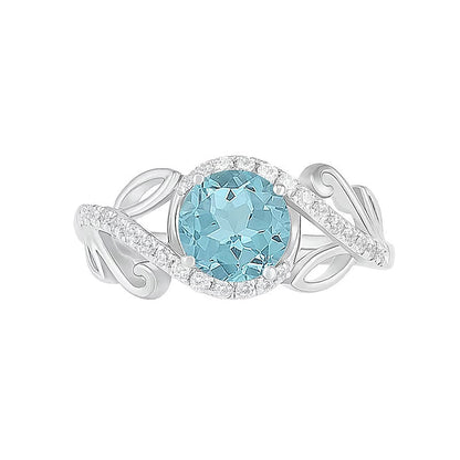 7,0 mm Aquamarin und 0,38 ct. Gesamtgewicht Diamant Bypass Brautset mit Blattdesign-Ringschiene in 10K Weißgold