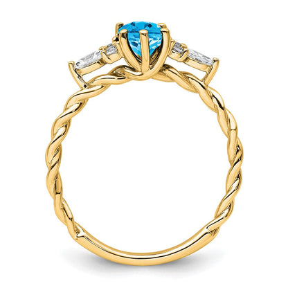14K Gelbgold Ring mit Diamanten und 7x5 ovalem Dezember-/Blautopas, Größe 7, gedreht