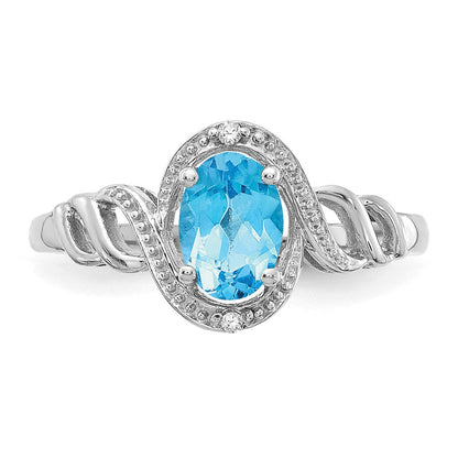 10K Weißgoldring mit hellem Swiss-Blue-Topas und Diamanten