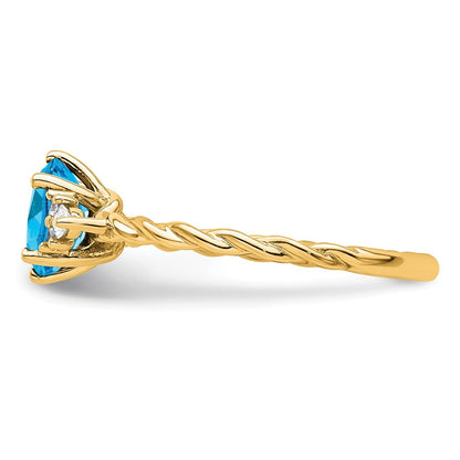 14K Gelbgold Ring mit Diamanten und 7x5 ovalem Dezember-/Blautopas, Größe 7, gedreht